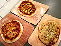 Sourdough pizzas with a mix of toppings